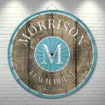 Cible De Fléchettes Rustic Wood Blue Nom de famille<br><div class="desc">Ce tableau de bord rustique est l'ajout parfait à votre maison de plage familiale, maison de lac, salle de jeux, grotte homme, et plus encore. Il présente un monogramme initial audacieux au centre, avec votre nom de famille fièrement affiché en haut. Le bas indique "Beach House", mais cela peut être...</div>