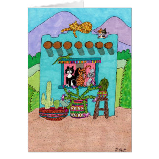 Cinq chats dans un Aqua Adobe House