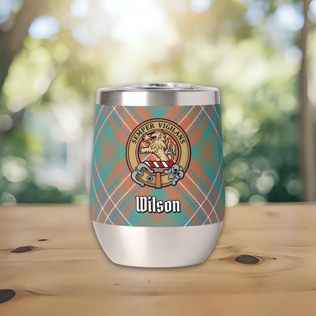 Clan Wilson Crest au-dessus de Tartan antique (Créateur téléchargé)