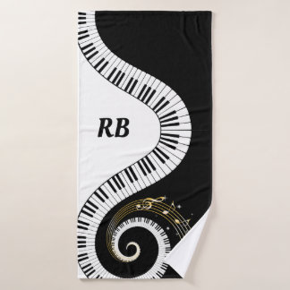 Clés de piano de monogramme et notes musicales