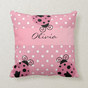 Coccinelle rose et coussin personnalisé par pois