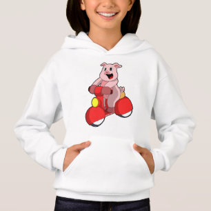 Cochon en vélo avec Scooter