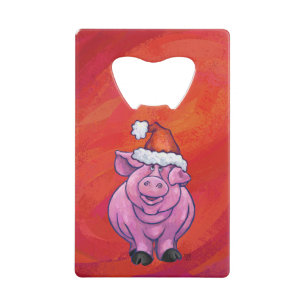 Cochon mignon à Santa Hat sur rouge