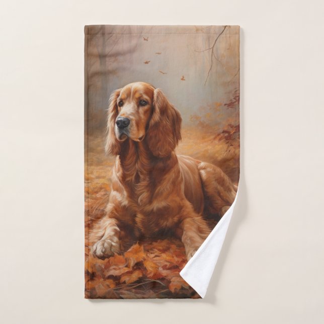 Cocker Spaniel dans les feuilles d'automne qui tom (Serviette à main)