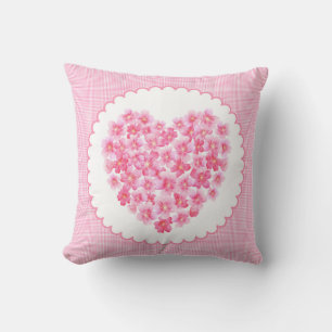 Coeur coussin de la fleur rose