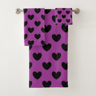 Coeurs de polka noir sur violet
