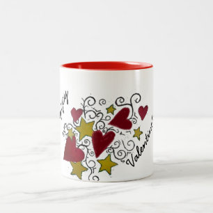 Coeurs et tasse de heureuse Sainte-Valentin
