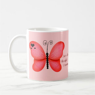Coeurs et tasse rouge de citation de papillons