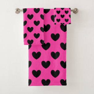 Coeurs polka noirs sur rose fuchsia