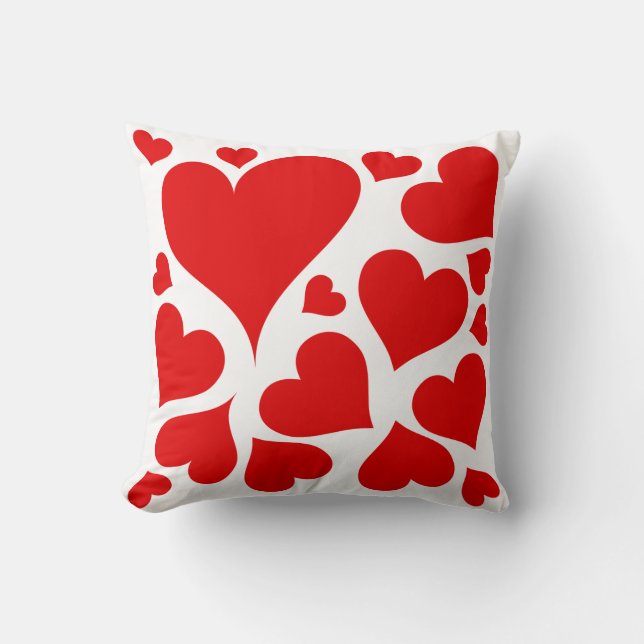 Coeurs rouges sur le coussin blanc d'amour (Recto)