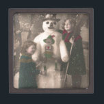 Coffret A Bijoux Photo de Christmas Girls et Snowman Vintage<br><div class="desc">A charming antique 1910 French Christmas photo postcard of two pretty,  adorable little girls happily hugging and posing with their solive snowman friend,  as snow flow down upon them. Wishing a Joyeux Noel.</div>