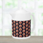 Collarette rose Dahlia motifs floraux sur noir<br><div class="desc">Théière en céramique blanche avec couvercle qui présente l'image d'une fleur rose Collarette Dahlia sur un arrière - plan noir et imprimé dans un motif extensible. Un joli design floral !</div>