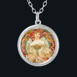 Collier Alphonse Mucha Art Nouveau Daydream<br><div class="desc">Collier avec la lithographie d’Alphonse Mucha Reverie (1897). Un portrait d'une femme en robe blanche lit un livre,  assis devant des fleurs roses et oranges. Un grand cadeau pour les amateurs d'Art Nouveau et d'Art Bohème.</div>