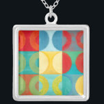 Collier Art Pop brillant avec cercles et Carré<br><div class="desc">Fluorescent n'est plus seulement pour les lumières comme le prouve cette oeuvre d'art pop merveilleusement brillante. Cette impression est un mélange de grilles carrés avec des cercles colorés à l'intérieur. Si vous aimez l'art abstrait,  vous adorerez cette impression !</div>