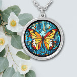 Collier Beurre orange Bleu Verre<br><div class="desc">Sur ce collier unique est l'image d'un beau papillon orange et or contre un arrière - plan de style vitrail. L'arrière - plan et la frontière sont dans les tons bleus. Élégant, lumineux et coloré ! Assurez-vous de voir les boucles d'oreilles et le porte - clé correspondants dans notre magasin....</div>
