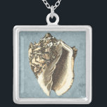 Collier Coque conique en pierre<br><div class="desc">Obtenez cette image de coquillage Conch en pierre unique sur votre prochain produit. Cet arrière - plan bleu et extraordinaire avec un conc bronzé aura l'air parfait sur n'importe quoi. Emmenez la plage avec vous partout où vous allez.</div>