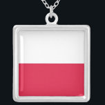 Collier élégant avec drapeau de la Pologne<br><div class="desc">Ajoutez une touche de fierté polonaise à votre collection de bijoux avec notre collier exclusif avec le drapeau de la Pologne! Conçu avec une attention minutieuse aux détails, ce collier est plus qu’un accessoire élégant, c’est une célébration du patrimoine polonais et de la fierté culturelle. Le design élégant affiche le...</div>