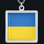 Collier élégant avec drapeau d'Ukraine<br><div class="desc">Portez votre fierté ukrainienne près de votre coeur avec ce magnifique collier arborant le drapeau de l'Ukraine ! Réalisé avec précision et attention aux détails, ce collier affiche fièrement le design emblématique du drapeau ukrainien - avec deux bandes horizontales de bleu et de jaune. Les couleurs vibrantes et la simplicité...</div>