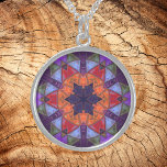 Collier En Argent Mosaic Kaleidoscope Fleur orange rouge et violet<br><div class="desc">Cette mosaïque kaléidoscope présente des carreaux oranges,  rouges et violets brillants. Un design géométrique vif inspiré par les fractales,  les mandalas et les mosaïques en vitraux. Obtenez ce design trippé magnifique maintenant et ajoutez des couleurs super à votre vie!</div>