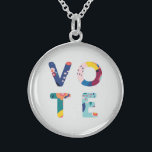 Collier En Argent Voter Moderne Modèle Floral Multicolore Politique<br><div class="desc">Sortez du vote cette année électorale avec ce collier magnifique et amusant ! Les lettres du mot "vote" sont composées d'un motif abstrait moderne,  fleuri,  dans les tons bleu,  vert,  jaune,  rose et orange. Fait un merveilleux cadeau pour l'activiste,  la politico ou l'étudiant dans votre vie.</div>