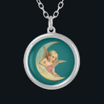 Collier Image vintage - Angel assis sur une lune de croiss<br><div class="desc">Un doux dessin vintage. Un ange paisible et gentil,  comme un enfant,  reposant sur la courbe d'un croissant de lune sur un arrière - plan vert foncé.</div>