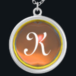 Collier Monogramme de gemme orange<br><div class="desc">Design élégant et unique avec pierres précieuses. Modélisation et rendu en 3D Studio Max par Bulgan Lumini .Part de la série Hyper Talismans.</div>