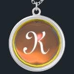 Collier Monogramme de gemme orange<br><div class="desc">Design élégant et unique avec pierres précieuses. Modélisation et rendu en 3D Studio Max par Bulgan Lumini .Part de la série Hyper Talismans.</div>