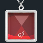 Collier Monogramme rouge rubis<br><div class="desc">Design élégant et unique avec pierres précieuses. Modélisation et rendu en 3D Studio Max par Bulgan Lumini .Part de la série Hyper Talismans.</div>