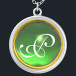 Collier Monogramme vert émeraude<br><div class="desc">Design élégant et unique avec pierres précieuses. Modélisation et rendu en 3D Studio Max par Bulgan Lumini .Part de la série Hyper Talismans.</div>