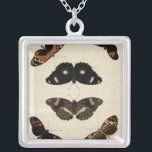 Collier Papillon coloré Medley sur Arrière - plan de crème<br><div class="desc">Une medley papillon très colorée posée sur un arrière - plan crème. Chaque insecte est dessiné avec des détails exquis,  capturant la beauté et l'essence de chaque créature unique. Un grand cadeau pour les papillons amoureux de votre vie!</div>