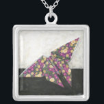 Collier Papillon Origami sur papier floral<br><div class="desc">Flottez comme un papillon avec cette belle pièce d'origami de Chariklia Zarris. Un joli papier à imprimer fleuri a été utilisé pour créer le papillon origami,  et les violets,  jaunes et verts sautent simplement de la pièce. Achète ta copie aujourd'hui !</div>