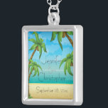 Collier Plage tropicale et palmiers Mariage Memento<br><div class="desc">Un souvenir pour les jeunes mariés ou un cadeau de remerciement pour la fête de la mariée, un design tropical illustrant une scène de plage avec palmiers et cocotiers. Le texte est entièrement personnalisable pour les détails de votre occasion spéciale. Ce collier memento coordonne avec la collection Mariage Tropical Beach...</div>