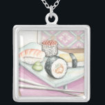 Collier Plaque de sushi assorté avec baguettes<br><div class="desc">Megan Meagher a peint cette assiette délicieuse de sushis assortis,  avec une paire de baguettes pour vous aider à apprécier le repas. Vous pouvez presque goûter à cette délicieuse collation ! Achetez votre imprimé dès aujourd'hui !</div>