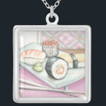 Collier Plaque de sushi assorté avec baguettes<br><div class="desc">Megan Meagher a peint cette assiette délicieuse de sushis assortis,  avec une paire de baguettes pour vous aider à apprécier le repas. Vous pouvez presque goûter à cette délicieuse collation ! Achetez votre imprimé dès aujourd'hui !</div>
