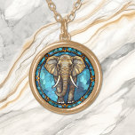 Collier Plaqué Or Eléphant Bleu Mosaïque Vitre<br><div class="desc">Sur ce collier unique est l'image d'un éléphant gris brun marchant vers le spectateur avec un arrière - plan de style mosaïque bleue. Une bordure design ornée ajoute de l'élégance au périmètre. Assurez-vous de voir les boucles d'oreilles et le porte - clé correspondants dans notre magasin.</div>