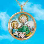 Collier Plaqué Or Sainte-Anne néogothique et Marie jeune (SAU 29)<br><div class="desc">Sainte-Anne, femme de saint Joachim, mère de Marie, la Sainte Vierge, grand-mère de Jésus. Sainte-Anne qui enseigne à Marie à lire les Écritures à partir d'un livre ou d'un parchemin est peut-être *le motif le plus familier aux spectateurs contemporains qui présente cette sainte. Les statues de Sainte-Anne et de Jeune...</div>