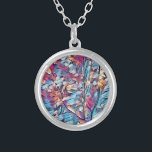 COLLIER TREE ABSTRACT<br><div class="desc">An abstract art design of a small woodland tree in blues,  reds and brown colours.</div>