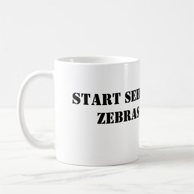 Commencez à voir la tasse de zèbres (Gauche)