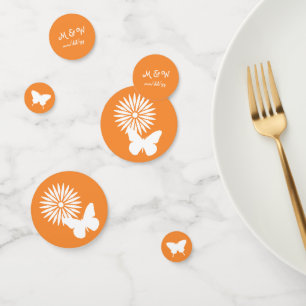 Confettis Marguerites et papillons dans la table orange Conf