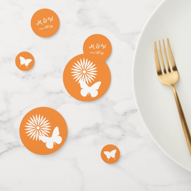 Confettis Marguerites et papillons dans la table orange Conf (Groupe)