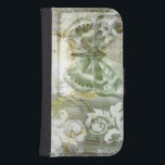Coque Avec Portefeuille Pour Galaxy S4 Entrée de papillon vert avec porte en fer<br><div class="desc">Jennifer Goldberger a peint ce magnifique morceau. Une entrée de papillon vert repose sur une porte en fer. Un tableau très avant-gardiste, il y a beaucoup de choses qui se cachent derrière des couleurs qui s'estompent et des fragments de motif. Cela ferait un grand cadeau à quelqu'un qui aime l'art...</div>