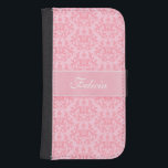 Coque du nom du ruban damassé kangourou rose<br><div class="desc">Un élégant et unique "Kangaroo Paws" et les coeurs damas et de style ruban modèle de boîtier de téléphone à rabat. Personnalisez cet objet avec votre nom. Voici l'exemple : Felicia. Le "Kangaroo Paw" est un plante originaire d'Australie occidentale, ce motif s'est inspiré de l'intéressante nature structurelle des "Kangaroo Paws"....</div>