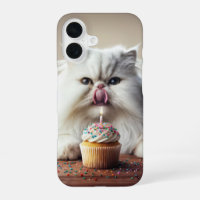 Chat Persan léchant un Cupcake d'anniversaire