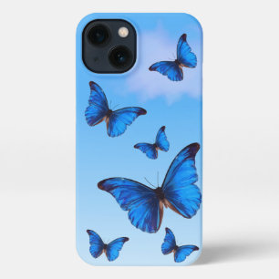 Etui iPhone 13 Bleu papillons Morpho volent dans le ciel