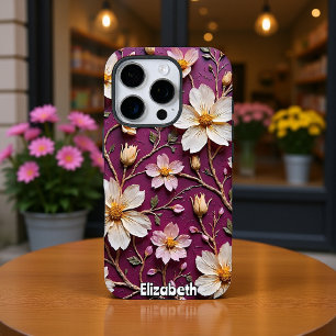 Coque iPhone 16 Pro Fleurs Crème Élégantes sur Fond Violet Texturé