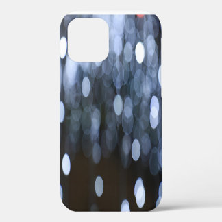 Coque iPhone 12 Fond de nuit bokeh argent et blanc.