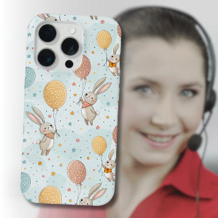Coque iPhone 15 Pro Lapins Mignons Tenant des Ballons en Forme d'Oeufs