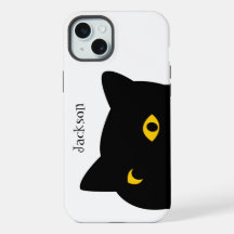 Le chat noir vous regarde avec les yeux dorés cout