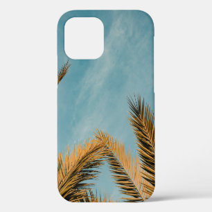Coque iPhone 12 Palmier vert sous ciel bleu le matin