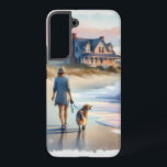 Coque Samsung Galaxy Coastal Walk to Lighthouse at Sunset<br><div class="desc">This dreamy coastal artwork captures a tranquil moment at the shoreline, where a woman strolls barefoot with her dog, the soft pastel tones of the setting sun casting a warm glow on the sand and sea. A charming beach house sits nestled among windswept grasses, its porch inviting and timeless, while...</div>